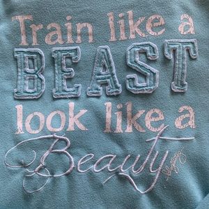 Well loved, but super comfy scoop necked sweat shirt.